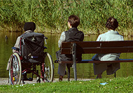 Women sitting by water